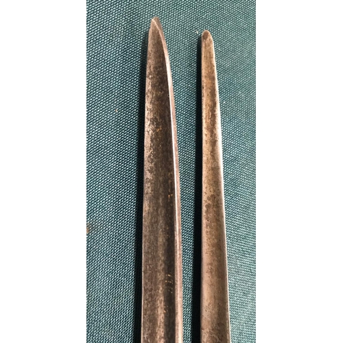 455 - TWO BRITISH SPIKE/SOCKET BAYONET BY JOHN GILL. A British spike bayonet with a 42cm triform blade sta... 