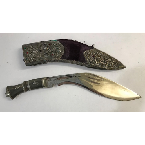 469 - A PRESENTATION KUKRI AND SCABBARD. A presentation Kukri knife with plated blade with pricked decorat... 