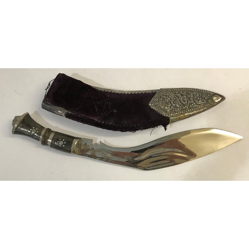 469 - A PRESENTATION KUKRI AND SCABBARD. A presentation Kukri knife with plated blade with pricked decorat... 