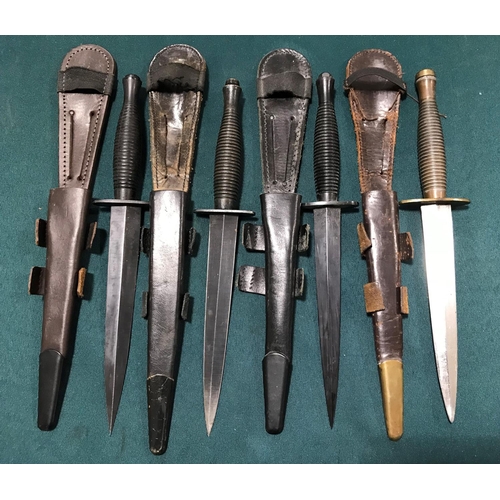 470 - A SYKES FAIRBAIRN TYPE COMMANDO FIGHTING KNIFE AND OTHERS. A Commando fighting knife with a double e... 