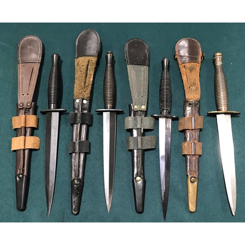 470 - A SYKES FAIRBAIRN TYPE COMMANDO FIGHTING KNIFE AND OTHERS. A Commando fighting knife with a double e... 