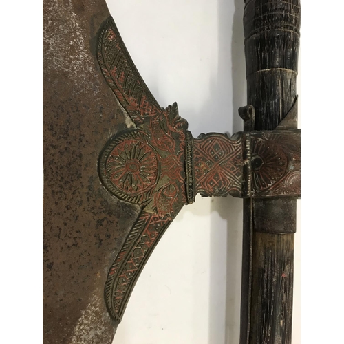 478 - TWO DECORATIVE INDIAN AXES. An Indian axe with a serpentine blade with sharpened edge on a decorativ... 