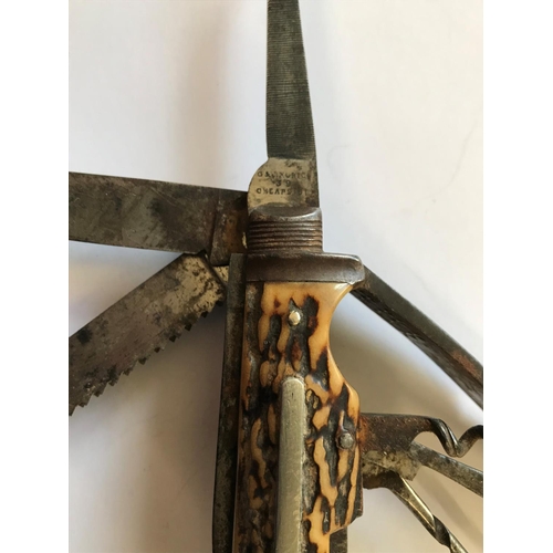 482 - A MORTON FOLDING NINE BLADE 'HORSEMAN' POCKET KNIFE. A eleven blade pocket knife with horn mounts an... 