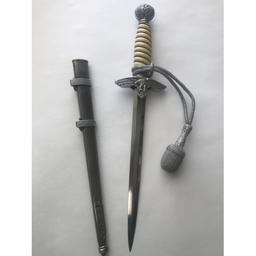 488 - A SECOND PATTERN LUFTWAFFE DAGGER AND SCABBARD BY SMF. The 25cm pointed blade marked for SMF Solinge... 