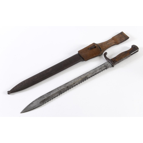 490 - A FIRST WORLD WAR MAUSER BAYONET AND SCABBARD. A First World War German 'Butcher' bayonet and scabba... 