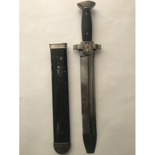 492 - A RED CROSS HEWER AND SCABBARD. The 27cm fuller blade with flatted tip, with saw blade to one edge, ... 