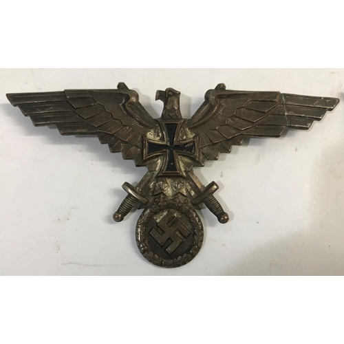 660 - TWO FIRST WORLD WAR VETERANS BADGES. A First World War Veterans badge with an eagle with wings outst... 