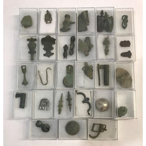 907 - A MEDIEVAL SWORD HANGER AND OTHER METAL DETECTING FINDS. A Medieval sword hanger, dagger chapes, a m... 