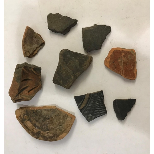 911 - ROMAN AND OTHER POTTERY FIELD FINDS. Ten pieces of pottery, Roman and similar, field finds.