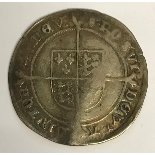 928 - AN EDWARD VI SHILLING. An Edward VI Shilling, facing bust with rose and value to either side, mint m... 