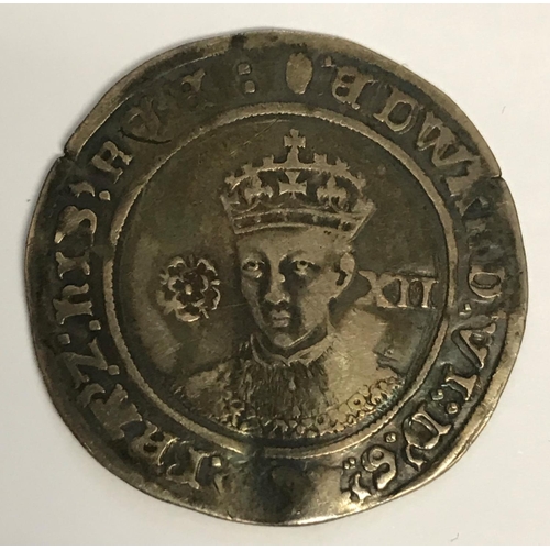 928 - AN EDWARD VI SHILLING. An Edward VI Shilling, facing bust with rose and value to either side, mint m... 