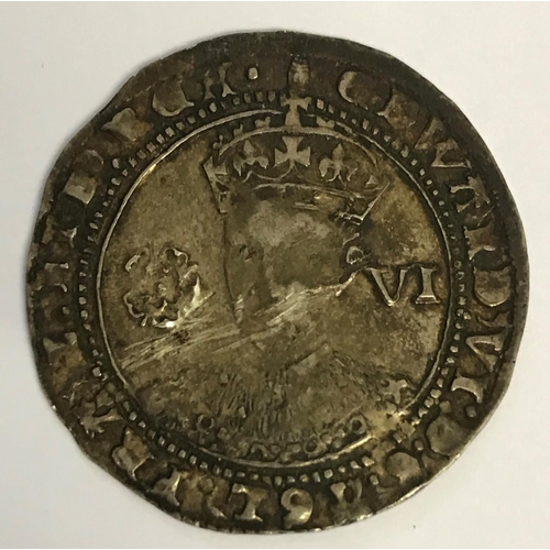 930 - AN EDWARD VI SIXPENCE. An Edward VI hammered Sixpence, facing bust with rose and value VI to either ... 