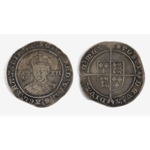 931 - AN EDWARD VI SHILLING. An Edward VI Shilling, facing bust, rose to the left and value XII to the rig... 