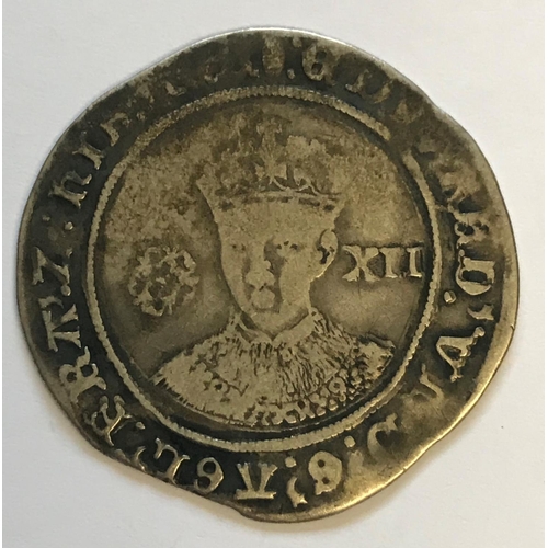 931 - AN EDWARD VI SHILLING. An Edward VI Shilling, facing bust, rose to the left and value XII to the rig... 