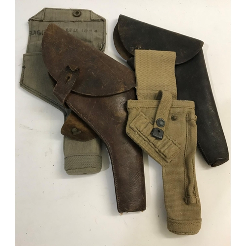 664A - TWO LEATHER AND TWO WEBBING HOLSTERS. Two leather belt or strap mounting holsters and two webbing ho... 