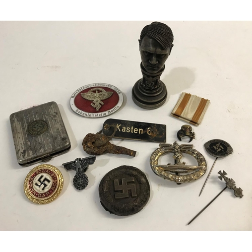 665 - A SMALL COLLECTION OF GERMAN SECOND WORLD WAR AND LATER ARTEFACTS. Two stick pins, one with three Gr... 