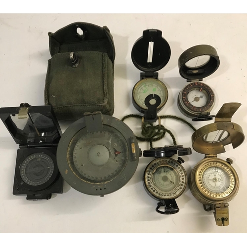 667 - A MEDIUM LANDING COMPASS AND OTHERS. A Medium Landing Compass No. 1122KHI/54, two second world war c... 