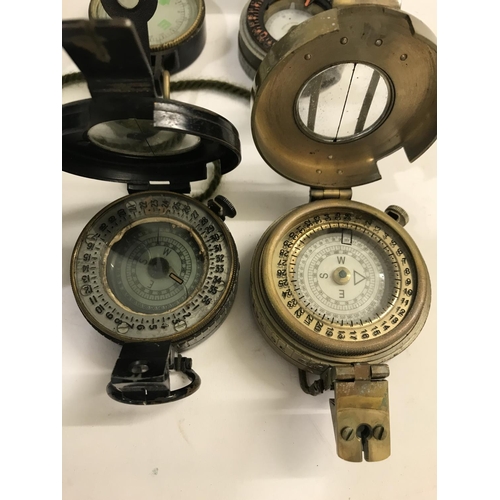 667 - A MEDIUM LANDING COMPASS AND OTHERS. A Medium Landing Compass No. 1122KHI/54, two second world war c... 