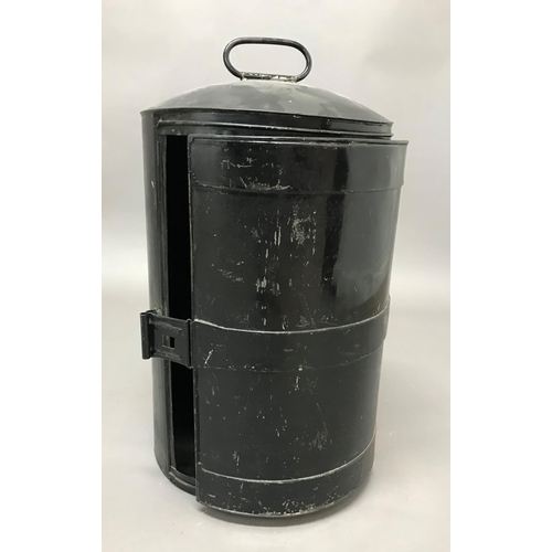 666A - A BEARSKIN HAT BOX. A Tall tin Bearskin hat box with single door, carrying handle and central suppor... 