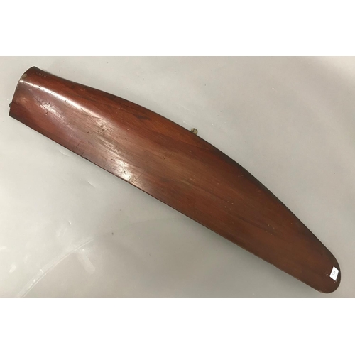 673 - A LAMINATED MAHOGANY PROPELLER BLADE. A propeller blade stamped P200, 118cm long, 26cm wide.