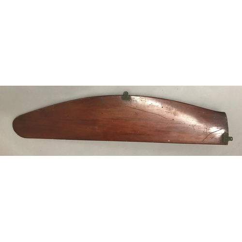 673 - A LAMINATED MAHOGANY PROPELLER BLADE. A propeller blade stamped P200, 118cm long, 26cm wide.