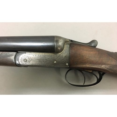 329 - A 12 BORE SHOTGUN BY C.G. EDWARDS AND SON. A 12 Bore shotgun with 70.4cm side by side barrels marked... 