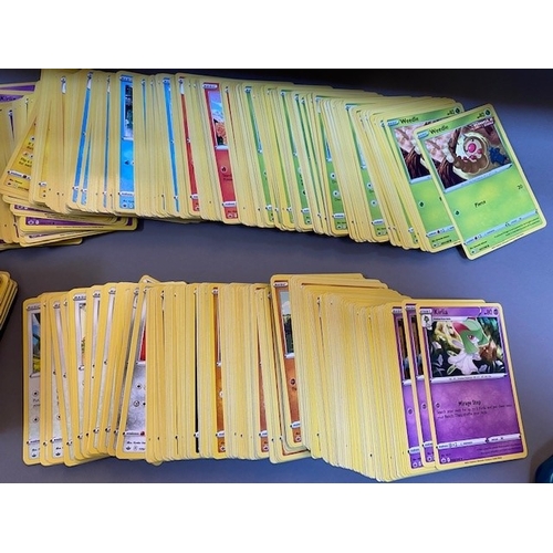 136 - Large Quantity of Assorted Pokemon Cards including Base Set, Jungle Set and Fossils and Modern Cards... 