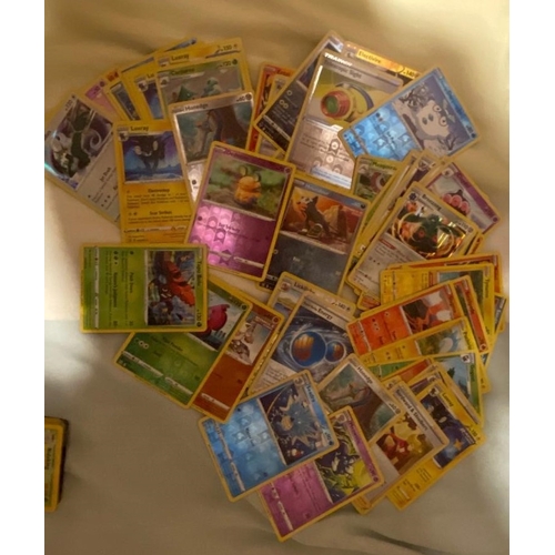 136 - Large Quantity of Assorted Pokemon Cards including Base Set, Jungle Set and Fossils and Modern Cards... 