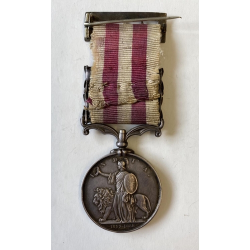 1009 - A TWO CLASP INDIAN MUTINY MEDAL 1857-58 TO THE 84TH REGIMENT. An Indian Mutiny Medal with Lucknow an... 