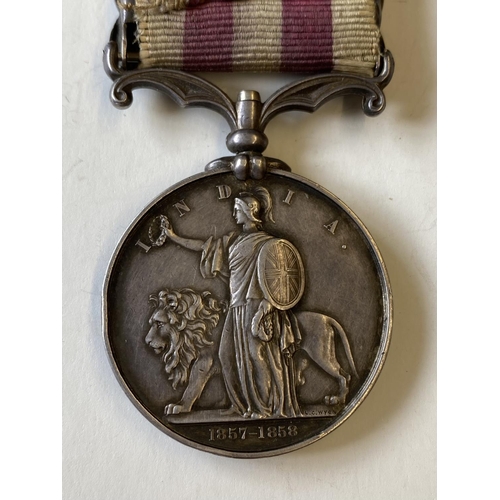 1009 - A TWO CLASP INDIAN MUTINY MEDAL 1857-58 TO THE 84TH REGIMENT. An Indian Mutiny Medal with Lucknow an... 