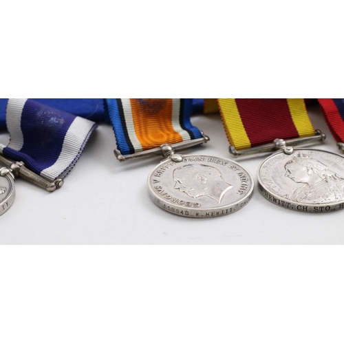 1030 - A VICTORIAN GROUP OF SIX TO THE ROYAL NAVY. A group of six comprising Egypt Medal with undated rever... 