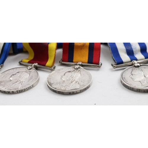 1030 - A VICTORIAN GROUP OF SIX TO THE ROYAL NAVY. A group of six comprising Egypt Medal with undated rever... 