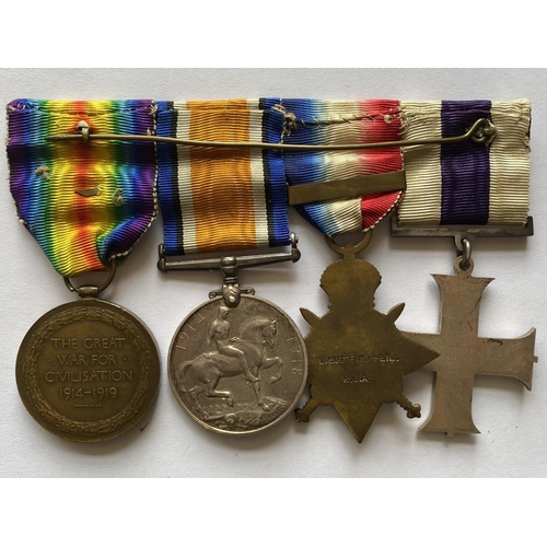 1032 - A MILITARY CROSS GROUP OF FOUR TO MAJOR PFEIL OF THE R.G.A. A Great War group of four comprising Mil... 