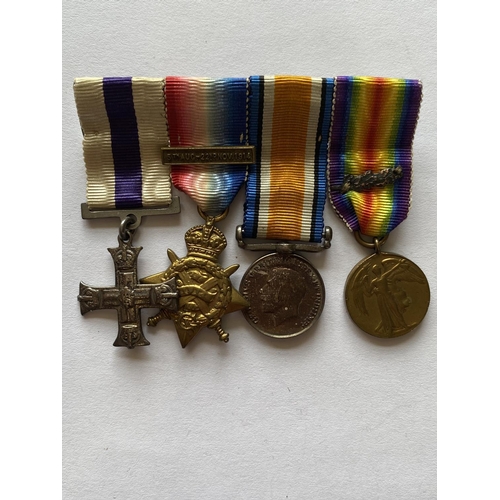 1032 - A MILITARY CROSS GROUP OF FOUR TO MAJOR PFEIL OF THE R.G.A. A Great War group of four comprising Mil... 