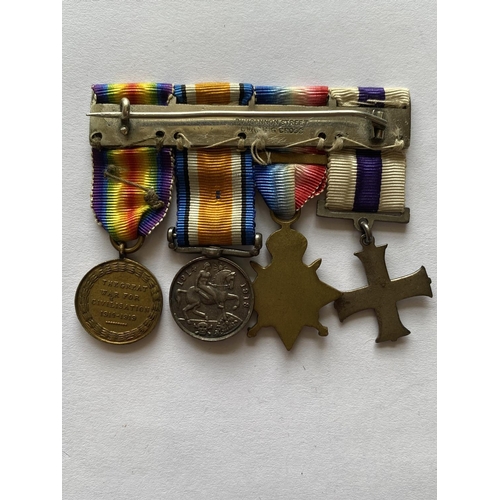 1032 - A MILITARY CROSS GROUP OF FOUR TO MAJOR PFEIL OF THE R.G.A. A Great War group of four comprising Mil... 