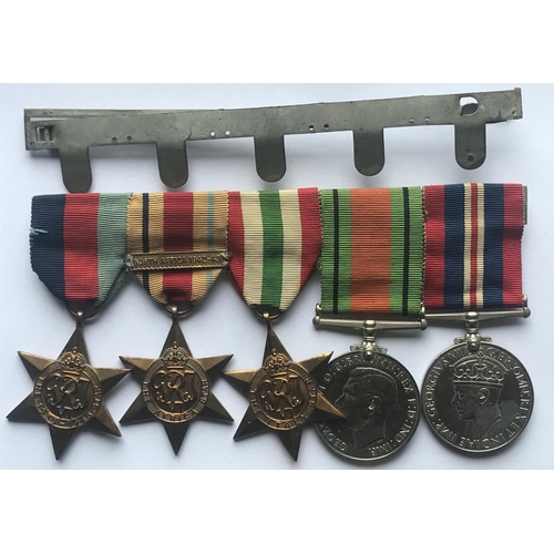 1036 - A SELECTION OF SECOND WORLD WAR MEDALS. A Second World War group of four comprising 1939/1945 and Bu... 