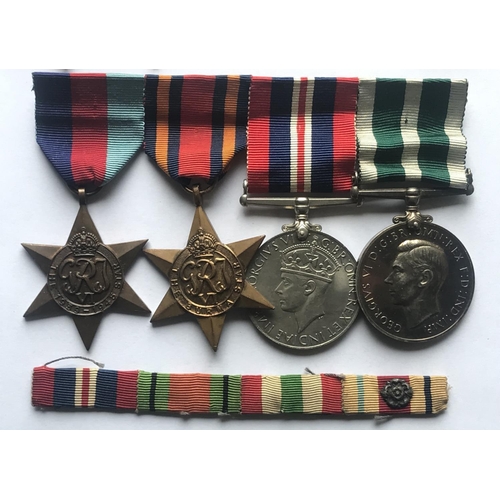 1036 - A SELECTION OF SECOND WORLD WAR MEDALS. A Second World War group of four comprising 1939/1945 and Bu... 