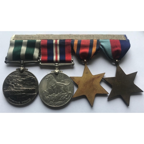 1036 - A SELECTION OF SECOND WORLD WAR MEDALS. A Second World War group of four comprising 1939/1945 and Bu... 