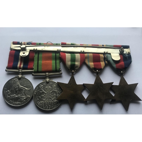 1036 - A SELECTION OF SECOND WORLD WAR MEDALS. A Second World War group of four comprising 1939/1945 and Bu... 