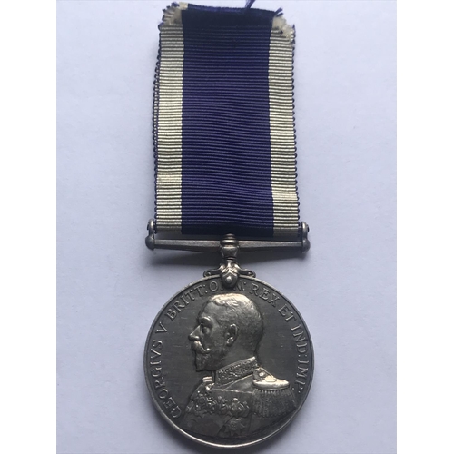 1042 - A GEORGE V ROYAL NAVAL LONG SERVICE AND GOOD CONDUCT MEDAL. A George V Long Service and Good Conduct... 