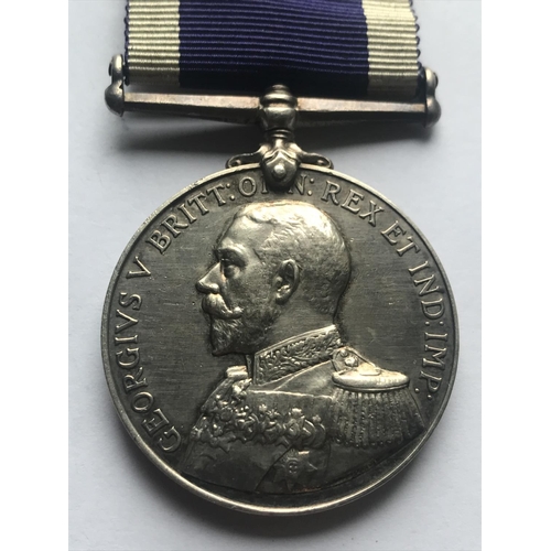 1042 - A GEORGE V ROYAL NAVAL LONG SERVICE AND GOOD CONDUCT MEDAL. A George V Long Service and Good Conduct... 