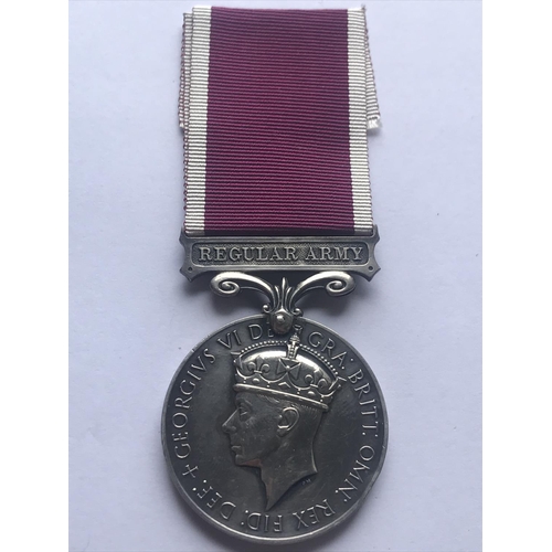 1045 - A GEORGE VI LONG SERVICE AND GOOD CONDUCT MEDAL. A George VI Long Service and Good Conduct medal wit... 