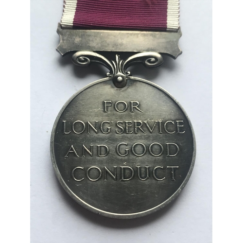 1045 - A GEORGE VI LONG SERVICE AND GOOD CONDUCT MEDAL. A George VI Long Service and Good Conduct medal wit... 