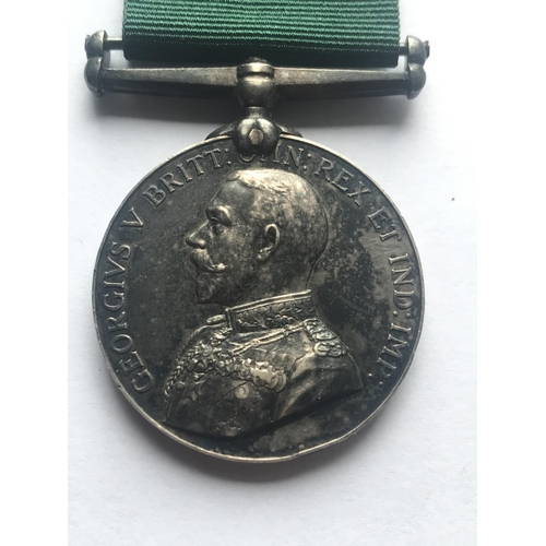 1046 - A GEORGE V VOLUNTEER FORCE LONG SERVICE AWARD. A George V Volunteer Long Service Medal named to 'Pte... 