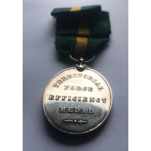 1048 - A GEORGE V TERRITORIAL FORCE EFFICIENCY MEDAL. A George V Territorial Force Medal named to '646 Sjt ... 