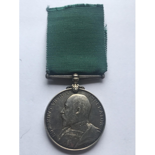 1049 - AN EDWARD VII VOLUNTEER FORCE LONG SERVICE AWARD. An Edward VII Volunteer Force Long Service award n... 