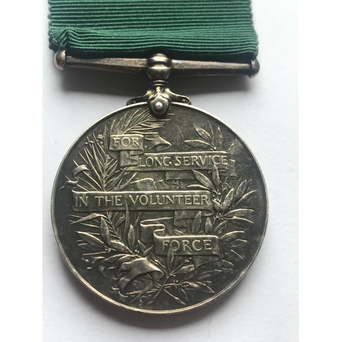 1049 - AN EDWARD VII VOLUNTEER FORCE LONG SERVICE AWARD. An Edward VII Volunteer Force Long Service award n... 