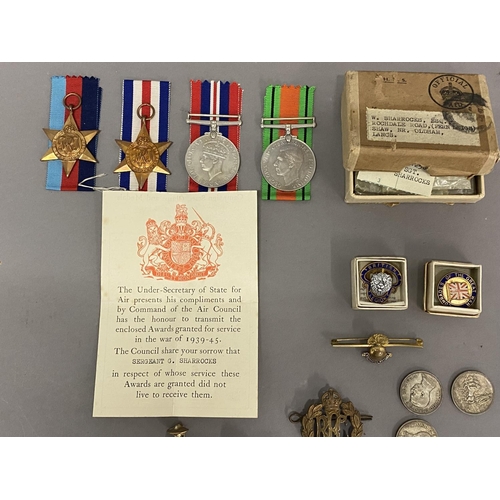 1063 - A POSSIBLE FAMILY GROUP OF FIRST AND SECOND WORLD WAR MEDALS. A Great war trio comprising War and Vi... 