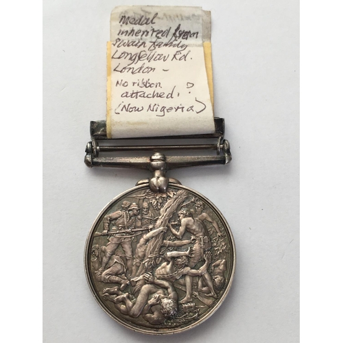 1069 - AN EAST AND WEST AFRICA MEDAL TO THE ROYAL NAVY. An East and West Africa Medal with Benin 1897 clasp... 