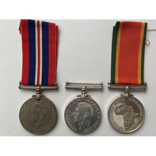 1076 - AN AFRICA SERVICE MEDAL AND TWO OTHERS. An Africa Service Medal, an unnamed example, Defence Medal, ... 